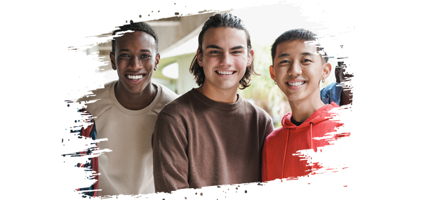 Three diverse teens at a school.