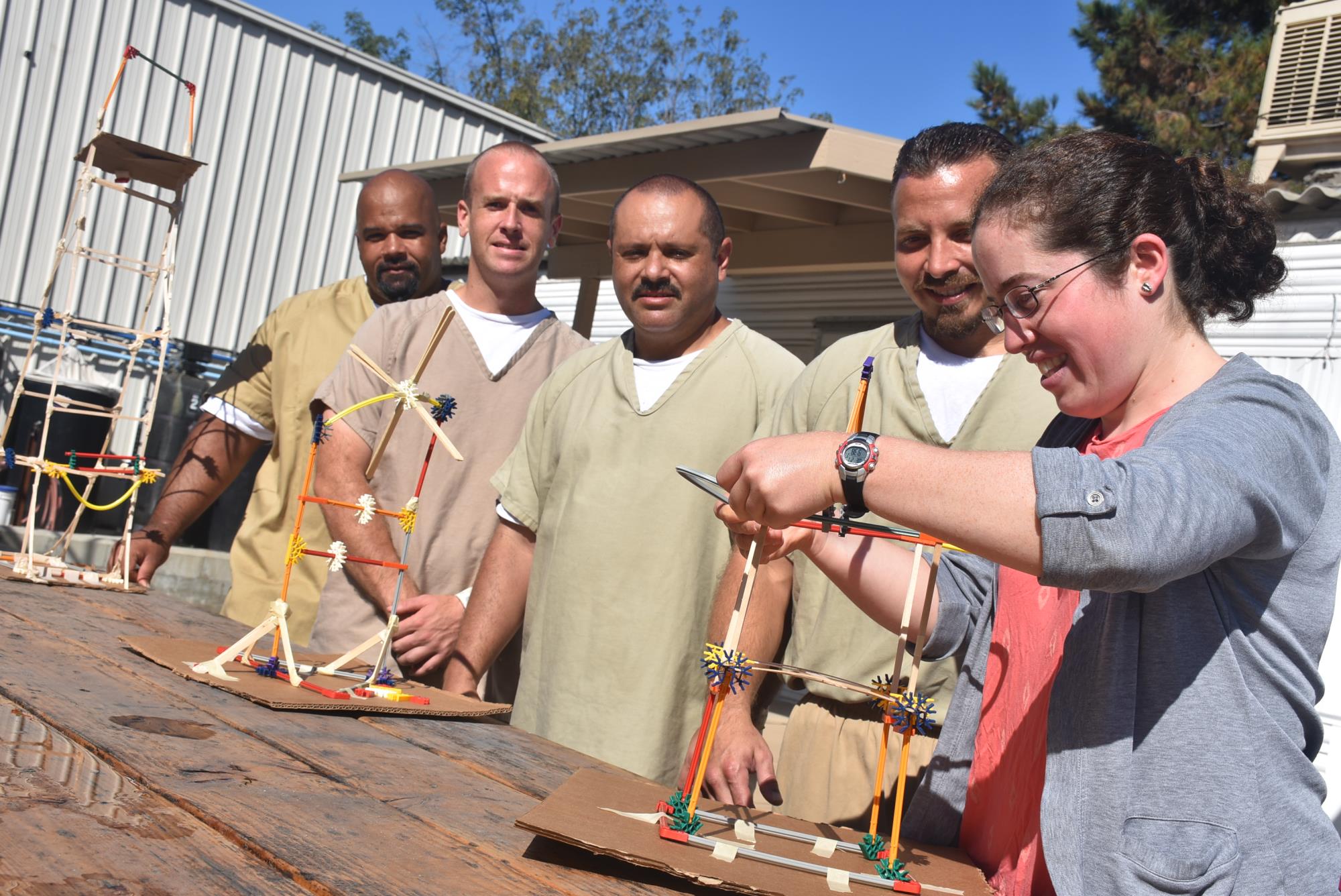 Students and teacher working on a science project